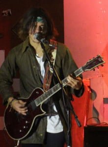 Above: Gunk guitarist